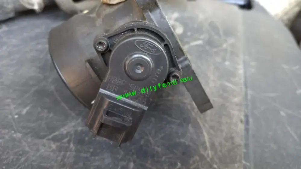 škrtící klapka Mondeo 01- 1.8i 92kW